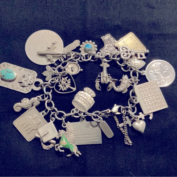 James Avery charm bracele with 21 charms